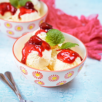 Ice cream with strawberry topping