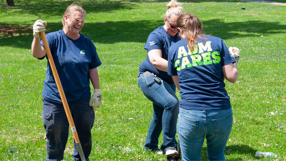 A group of women in blue t-shirts 