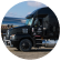ADM truck with liquid tanks in the background