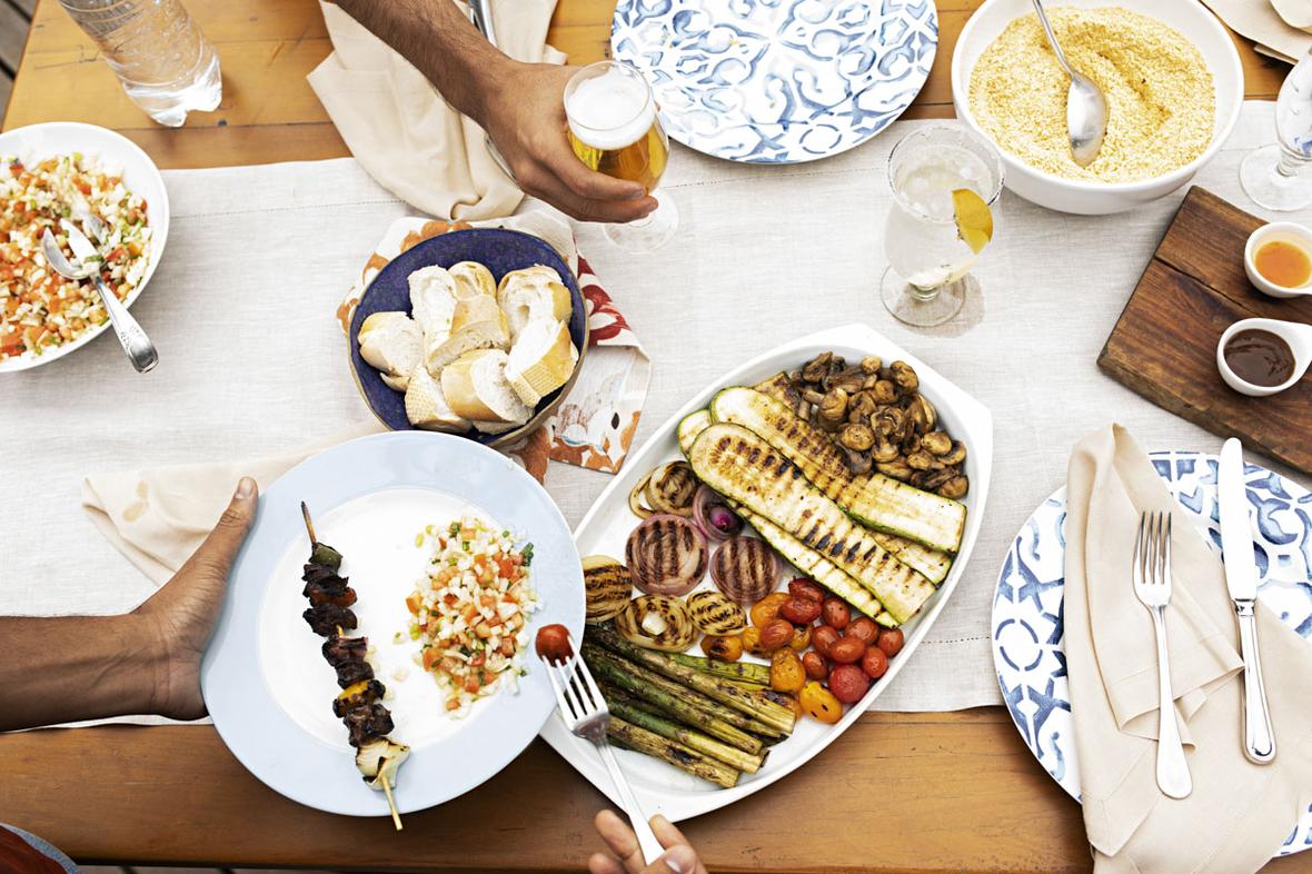 Overhead shot of BBQ food on table.